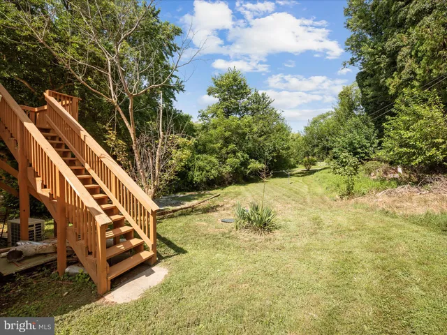 a view of an outdoor space and a yard