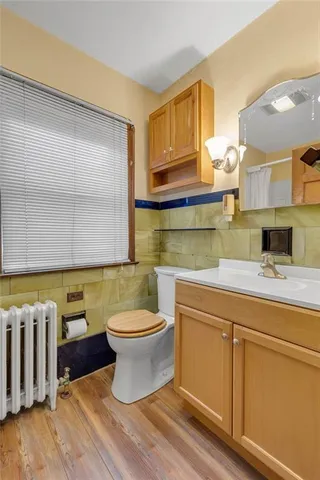 a view of a lake with a house in the background