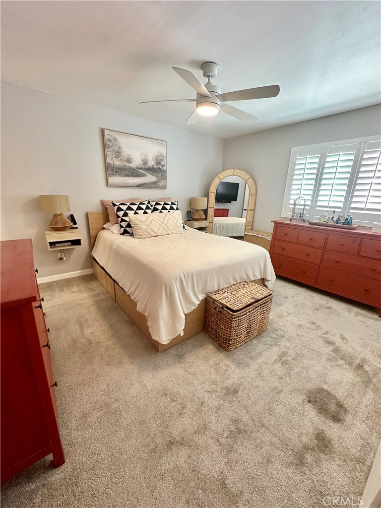 1045 East 3rd Street, Unit 4 Long Beach, CA 90802 - Photo 12 of 20 a spacious bedroom with a bed and window