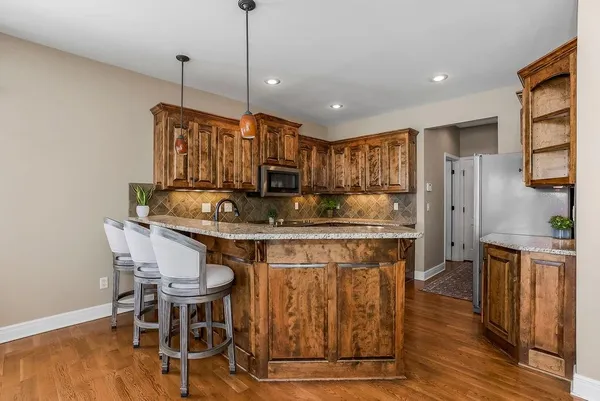 $590,000 | 1205 Richards Circle, Raymore, MO 64083