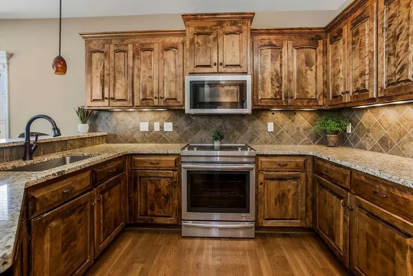 $590,000 | 1205 Richards Circle, Raymore, MO 64083