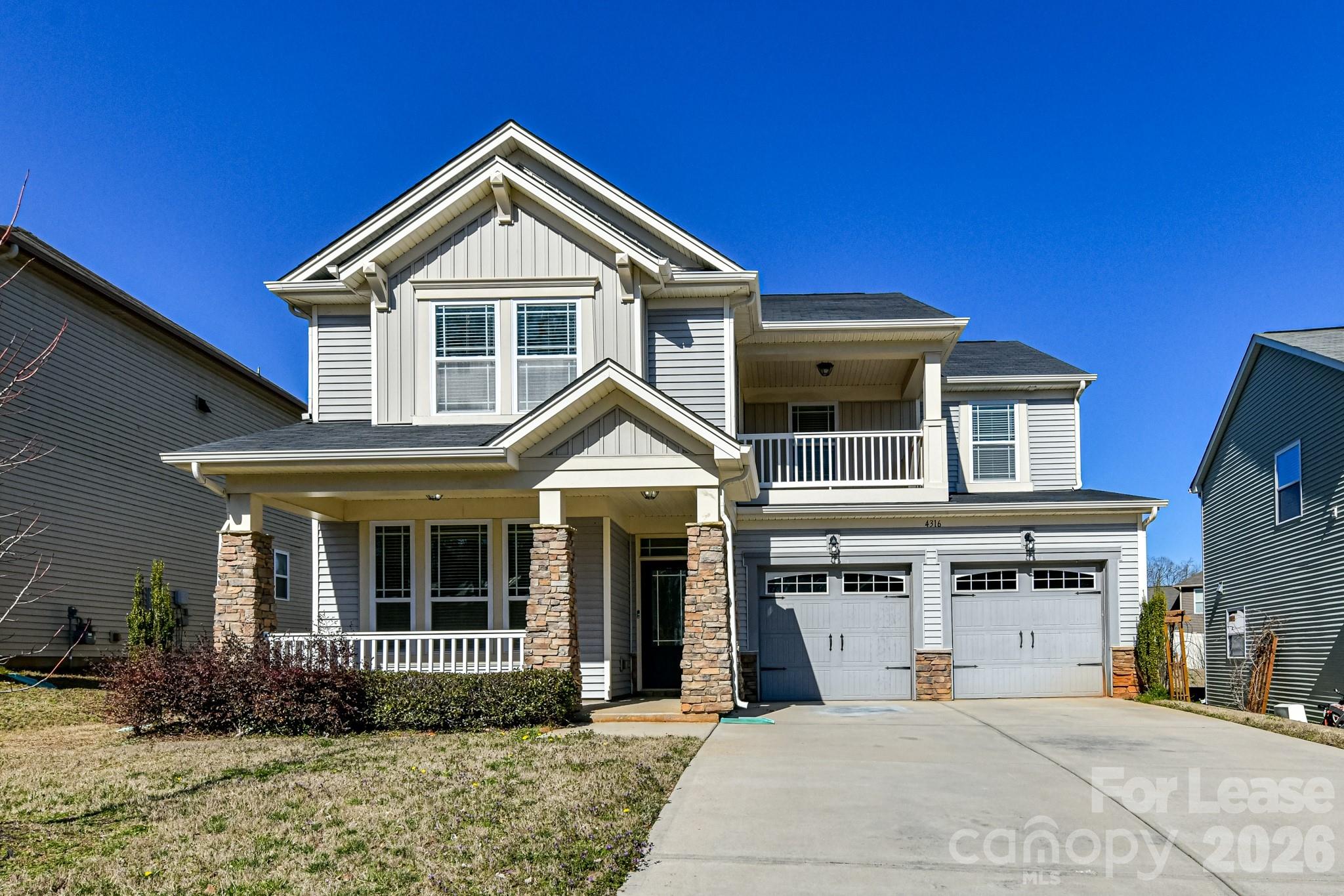 4316 Hubbard Road Charlotte, NC 28269 - Photo 1 of 46 a front view of a house with garden