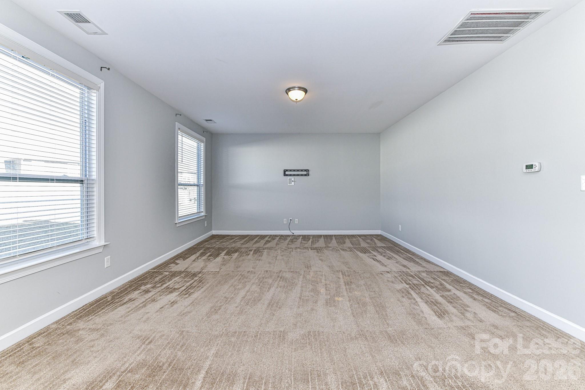4316 Hubbard Road Charlotte, NC 28269 - Photo 13 of 46 a view of empty room with window