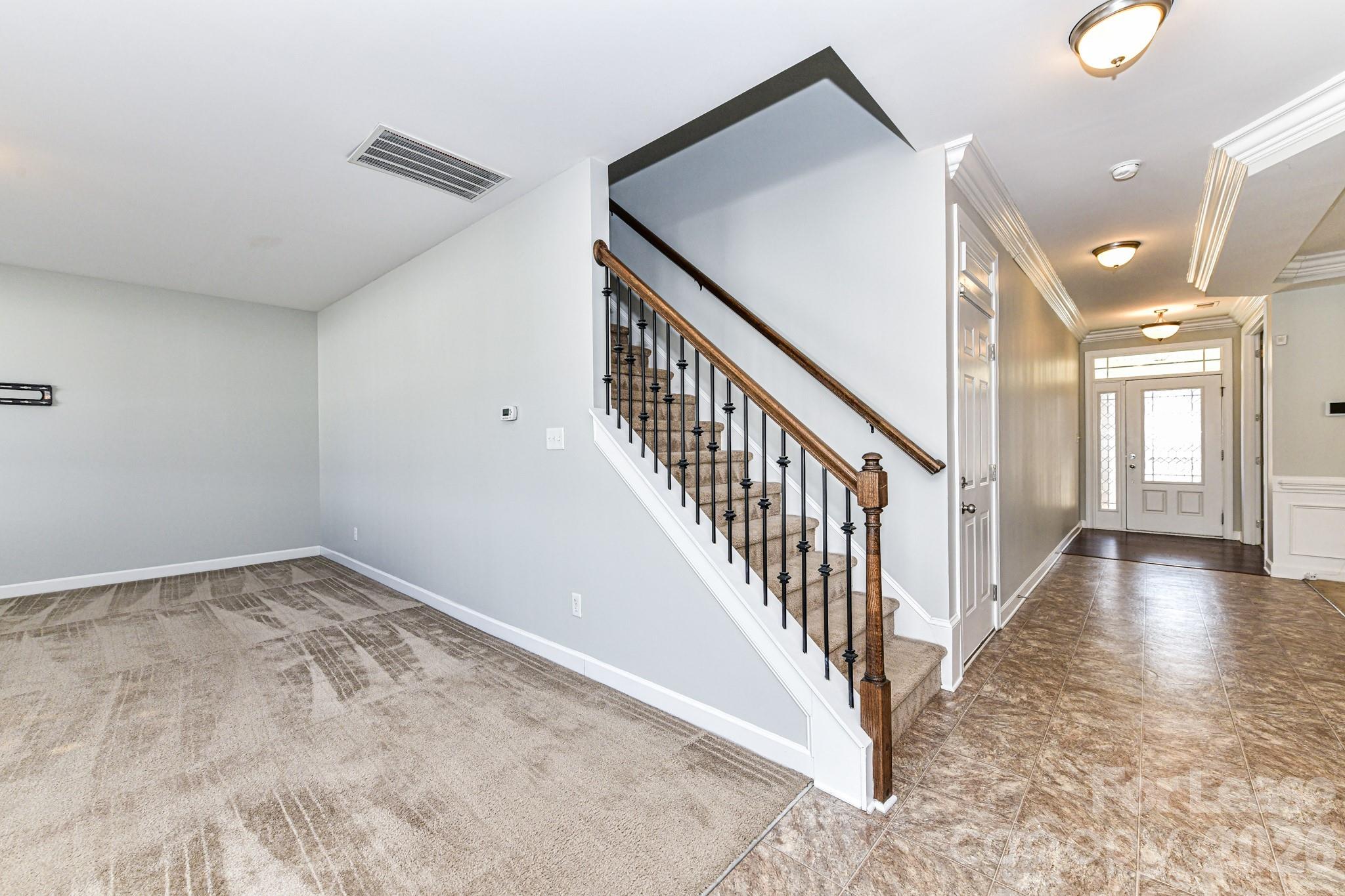 4316 Hubbard Road Charlotte, NC 28269 - Photo 23 of 46 a view of a hallway with staircase