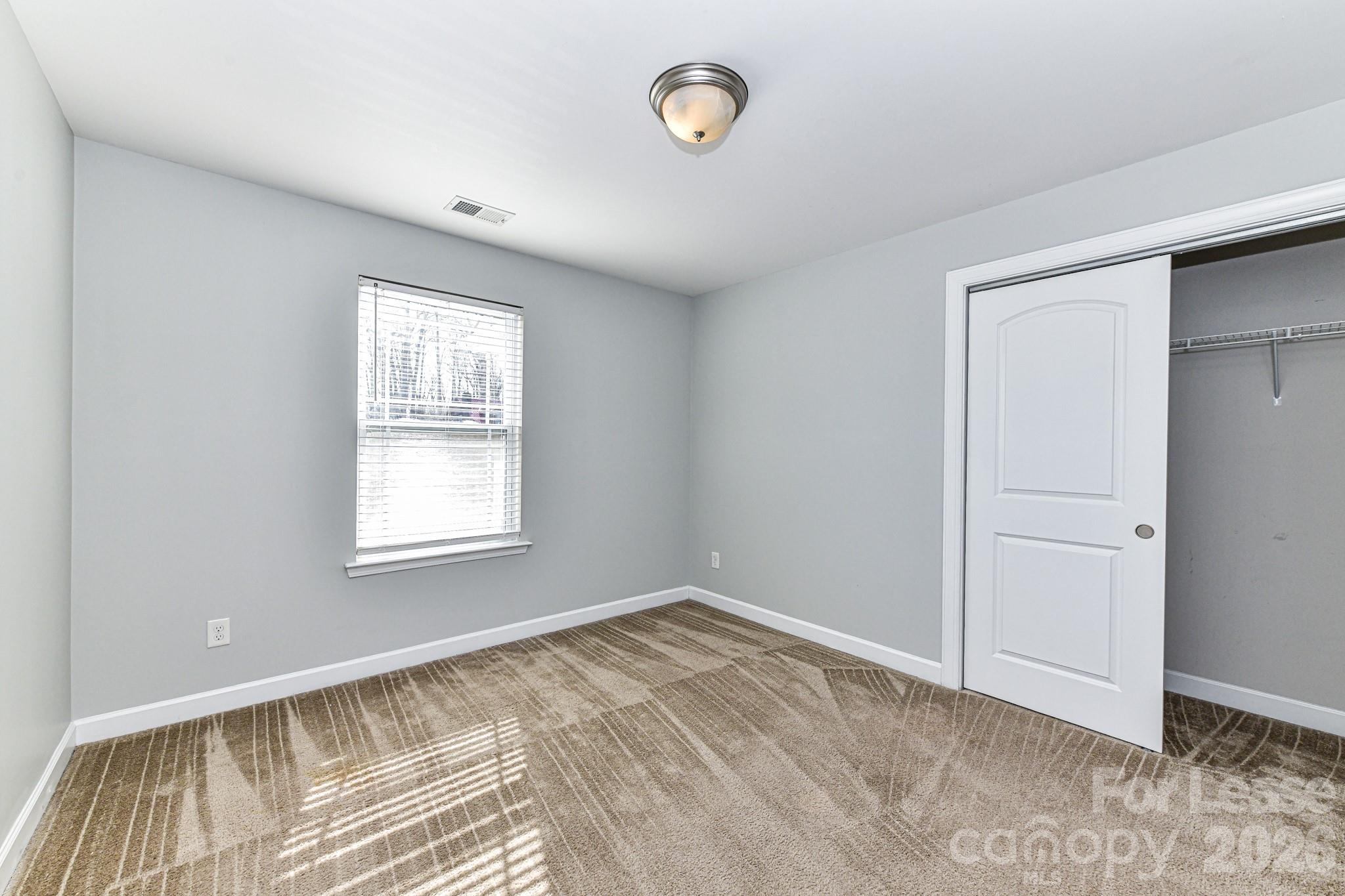 4316 Hubbard Road Charlotte, NC 28269 - Photo 32 of 46 wooden floor and window in a room