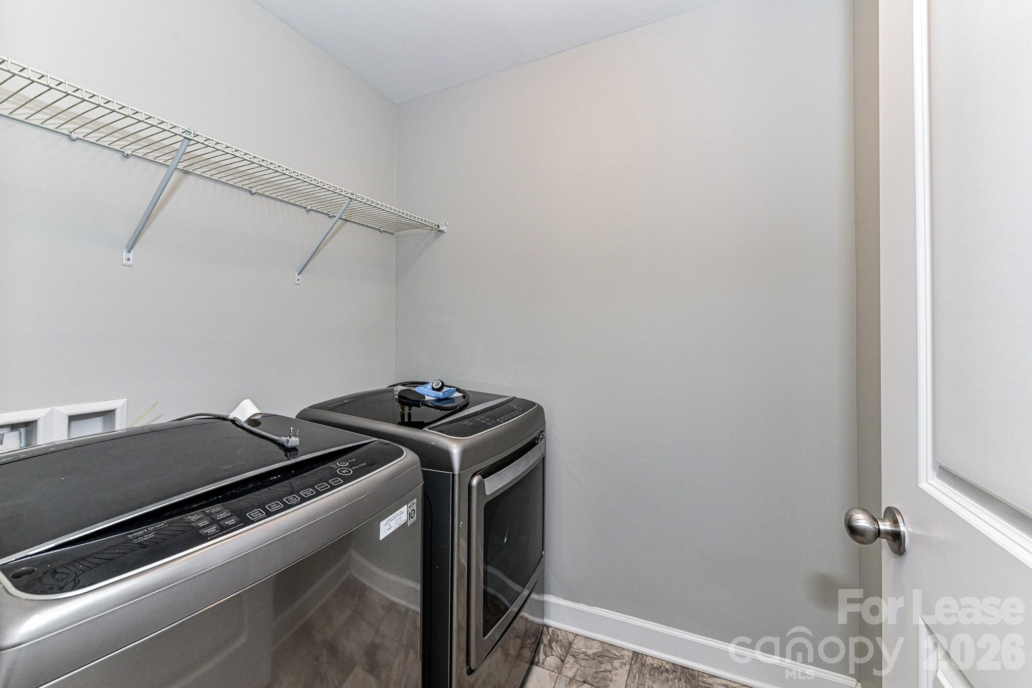 4316 Hubbard Road Charlotte, NC 28269 - Photo 39 of 46 a utility room with dryer and washer