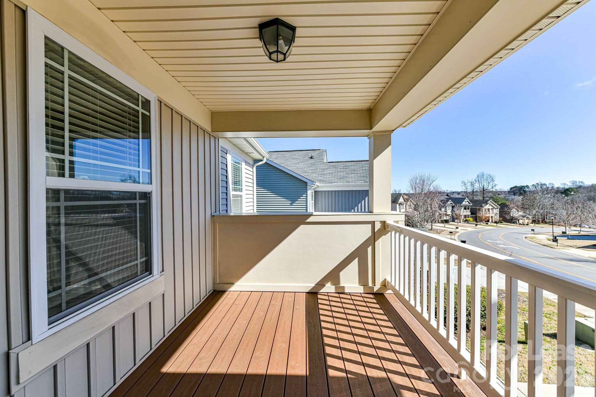 4316 Hubbard Road Charlotte, NC 28269 - Photo 40 of 46 a view of balcony with wooden floor