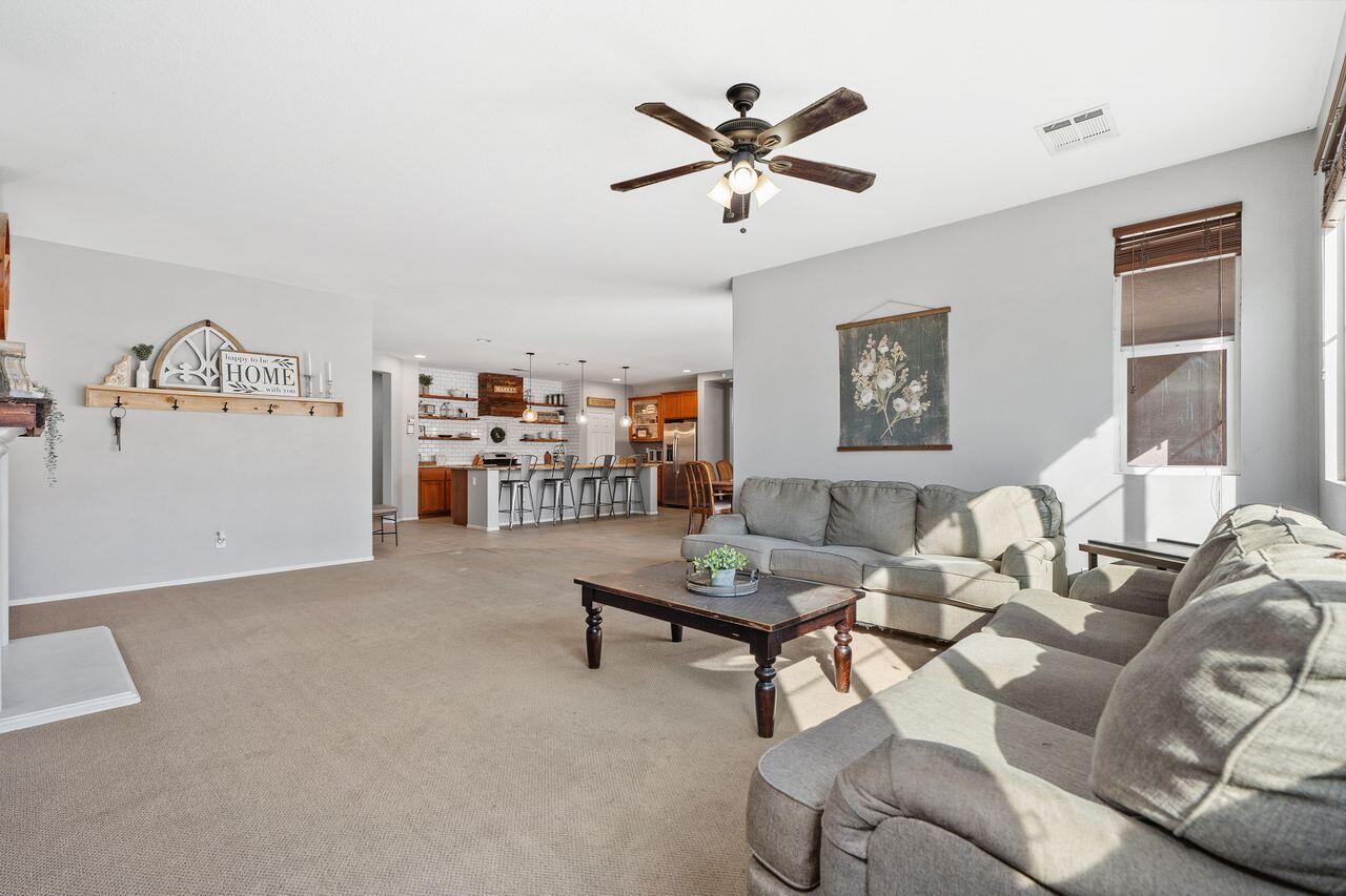 42724 Tango Court Indio, CA 92203 - Photo 12 of 27 a living room with furniture and a window