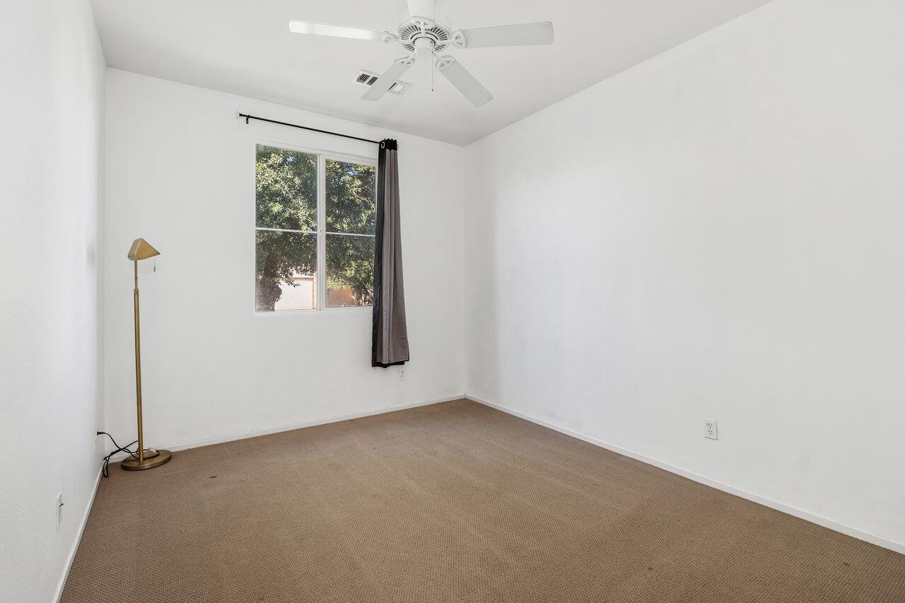 42724 Tango Court Indio, CA 92203 - Photo 19 of 27 an empty room with a window