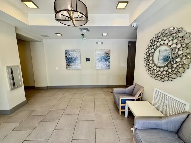 a living room with furniture and a table