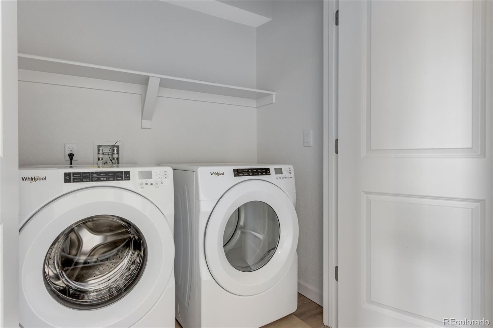2360 Merlot Street Fort Lupton, CO 80621 - Photo 19 of 21 a utility room with dryer and washer