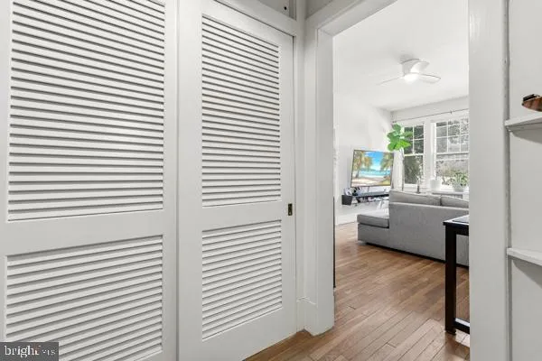 a room with a window and wooden floor