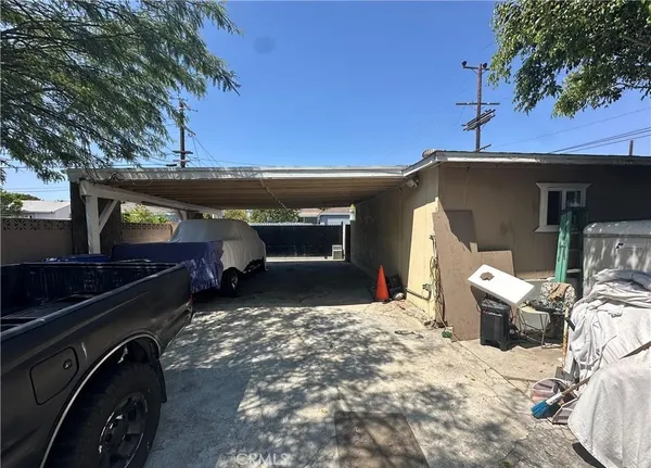 a view of a couches and a fire pit in the patio