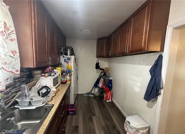 a view of a storage and utility room with a window