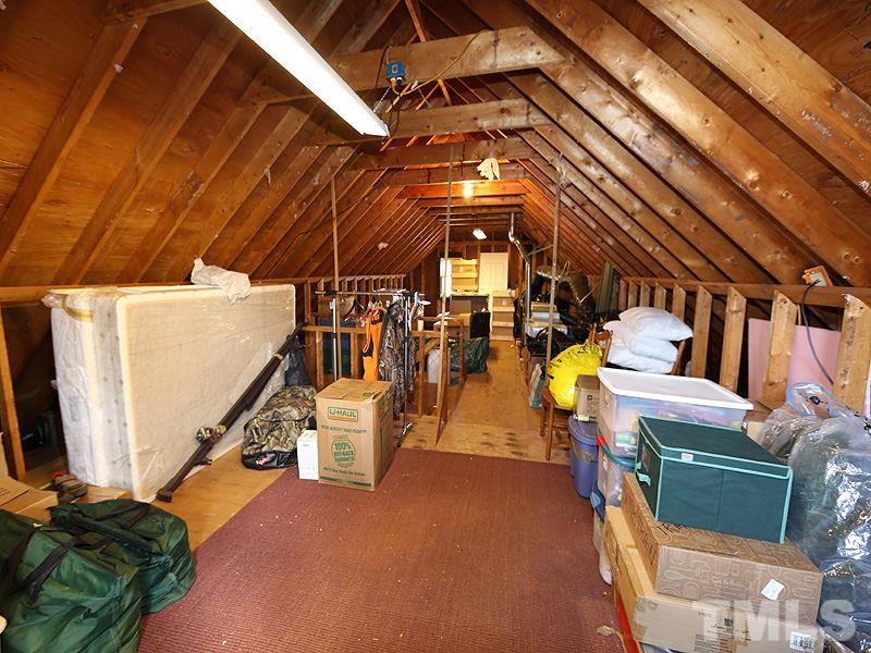 8208 Mourning Dove Road Raleigh, NC 27615 - Photo 19 of 25 a view of a room with gym equipment