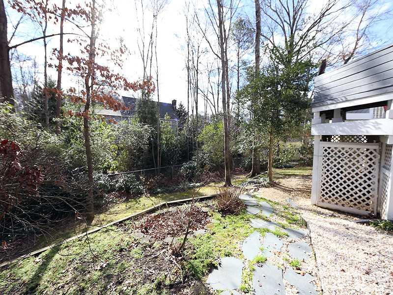 8208 Mourning Dove Road Raleigh, NC 27615 - Photo 23 of 25 a view of a yard and trees
