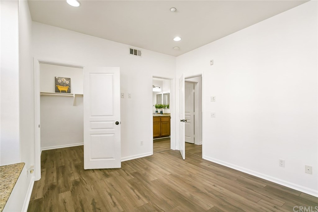 11313 Antonio Stanton, CA 90680 - Photo 17 of 30 Second floor bedroom with walk-in closet and attached bathroom