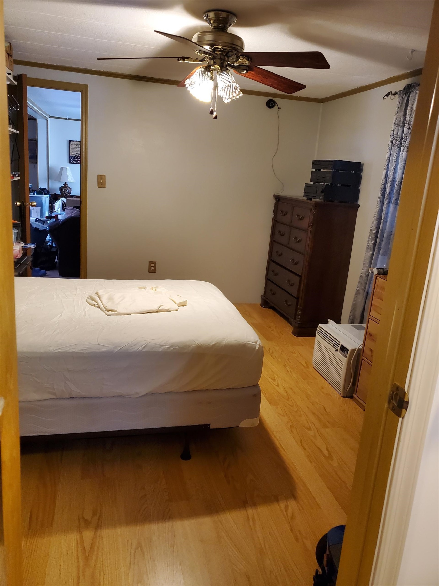 577 Miles Standish Lane Buena, NJ 08310 - Photo 7 of 11 a bedroom with a bed dresser and a window