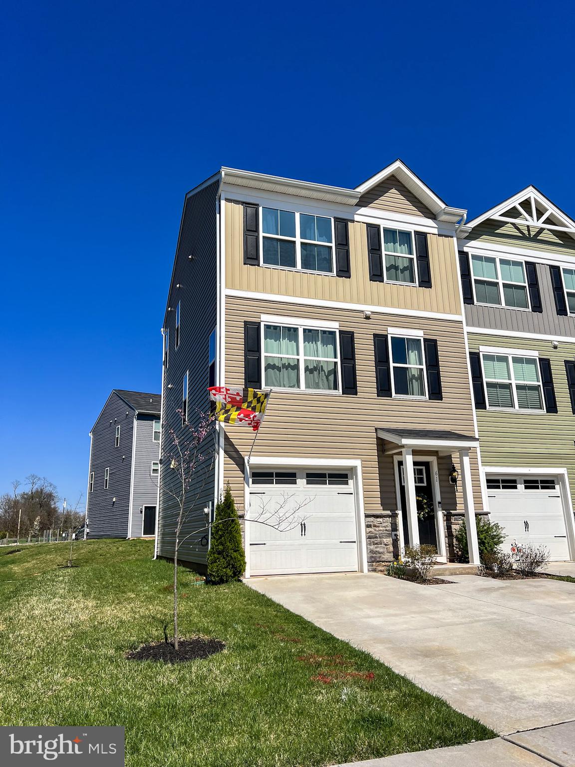 61 Grant Street Taneytown, MD 21787 - Photo 1 of 34 a front view of a house with a garden