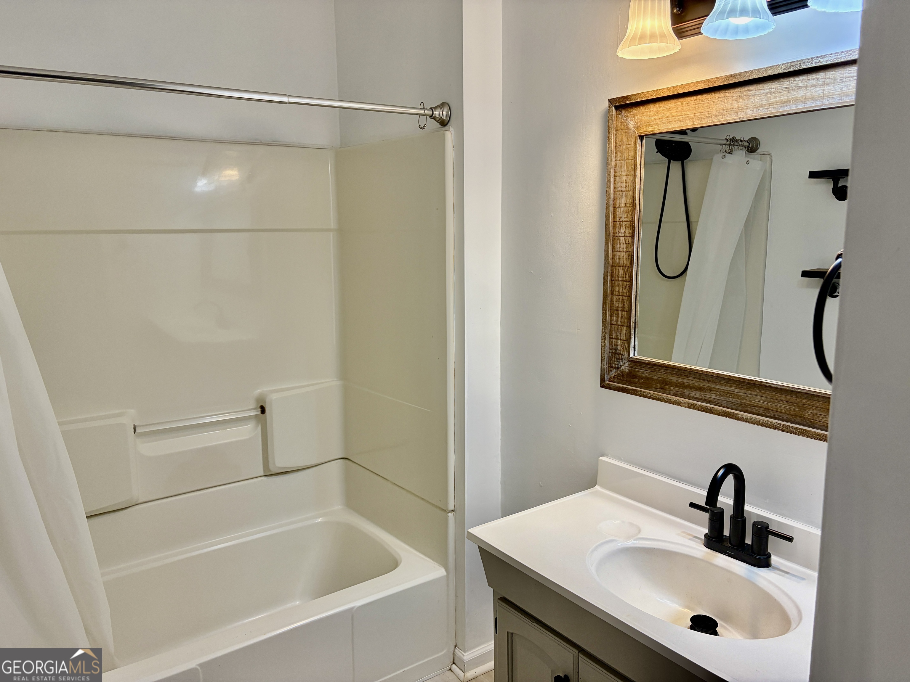9 Argon Drive Northwest Rome, GA 30165 - Photo 12 of 14 a bathroom with a sink a toilet and shower