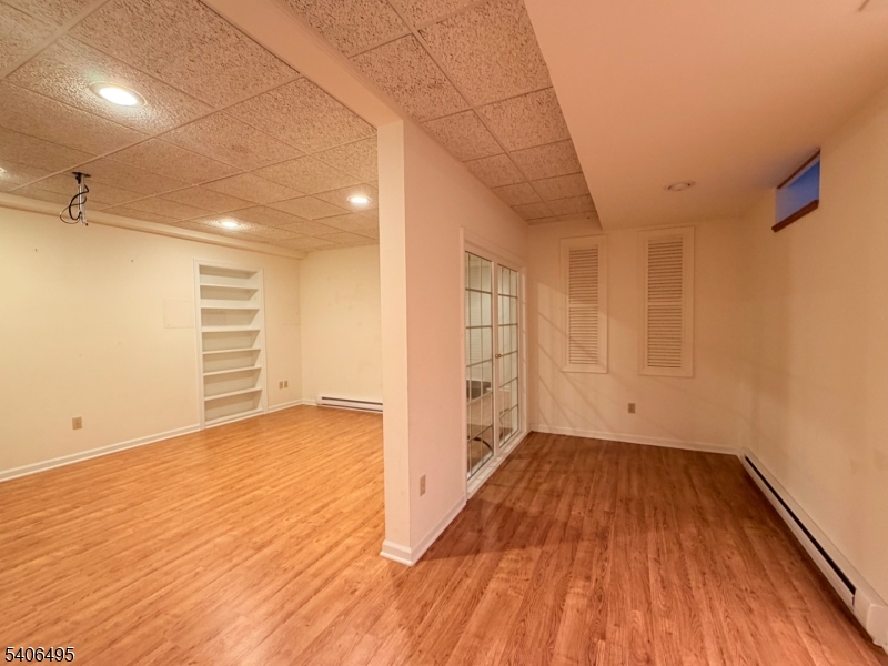41 Manor Drive Princeton, NJ 08540 - Photo 15 of 21 a view of a room with wooden floors and white walls