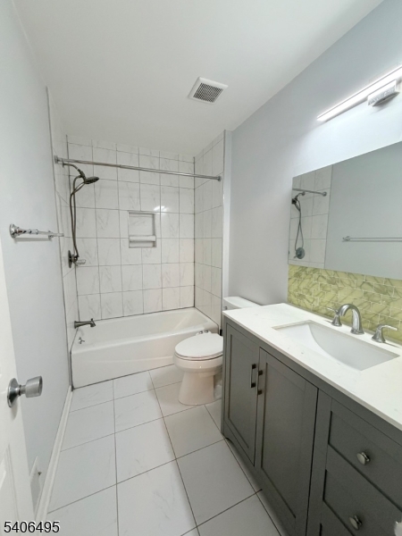 41 Manor Drive Princeton, NJ 08540 - Photo 20 of 21 a bathroom with a granite countertop sink a toilet and shower