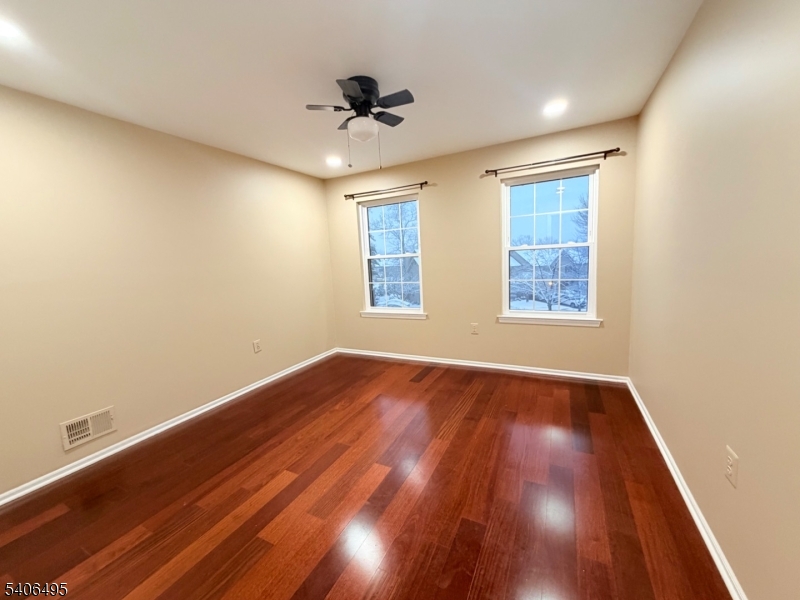 41 Manor Drive Princeton, NJ 08540 - Photo 21 of 21 a view of an empty room with wooden floor and a window