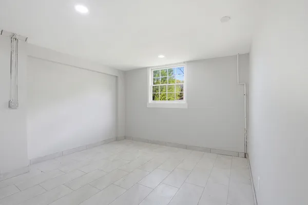 an empty room with windows
