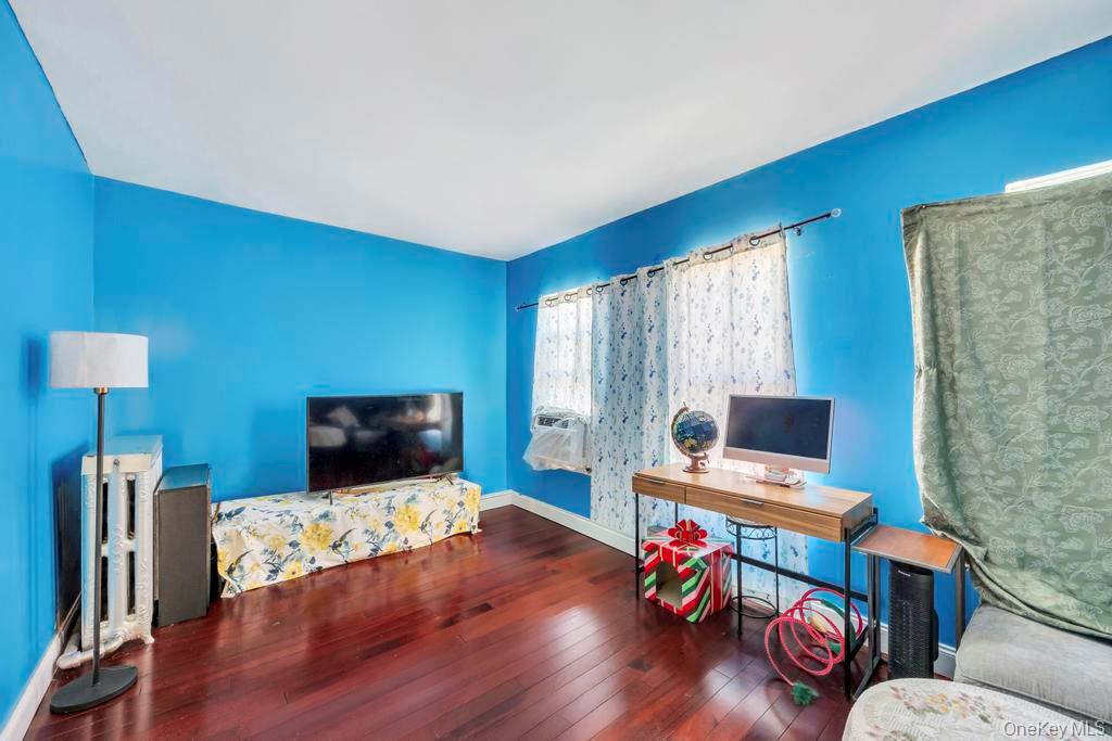 95-26 86th Street Queens, NY 11416 - Photo 15 of 28 Office space featuring hardwood / wood-style floors and cooling unit