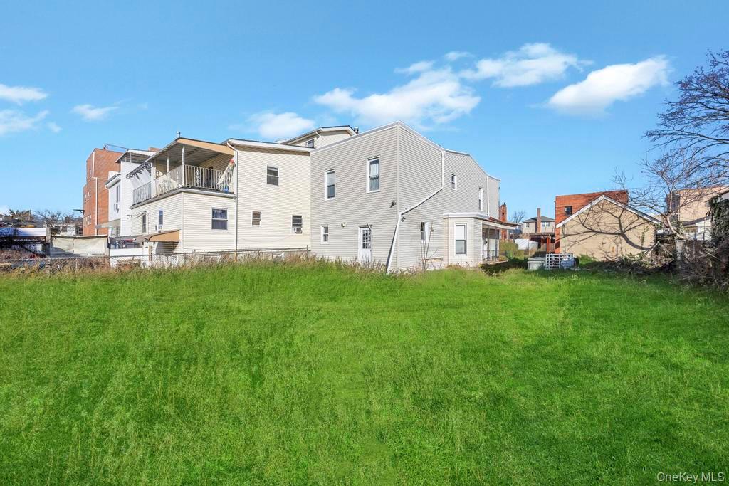 95-26 86th Street Queens, NY 11416 - Photo 5 of 28 Back of house with a balcony