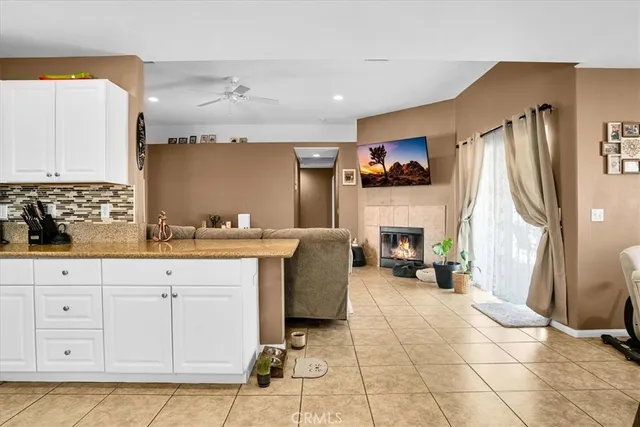 a bathroom with a tub shower and sink