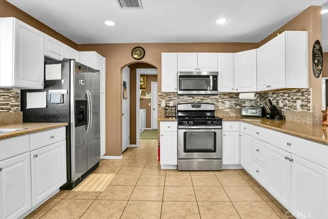 a view of a bathroom with a glass door and a shower