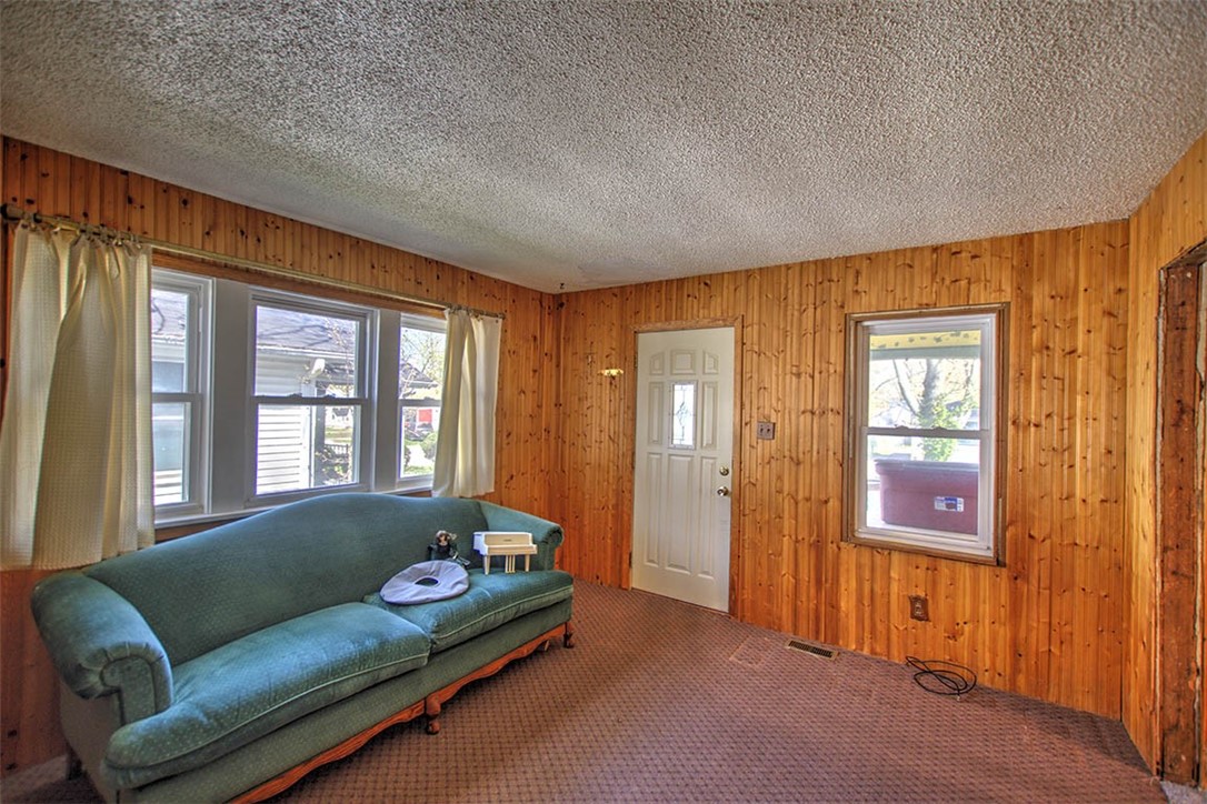2549 East Main Street Decatur, IL 62521 - Photo 2 of 12 a living room with furniture and a window
