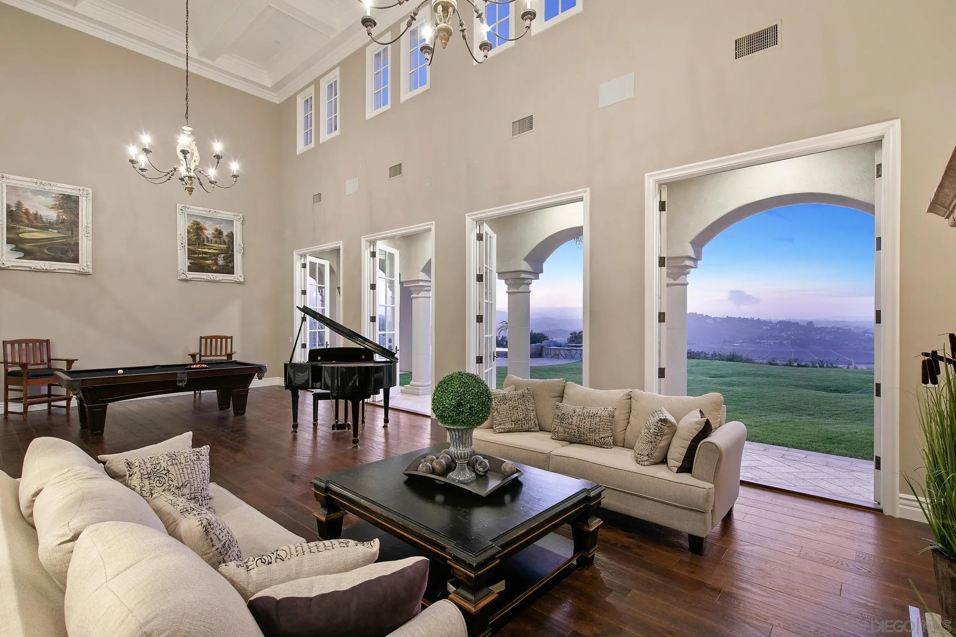 18781 Heritage Drive Poway, CA 92064 - Photo 11 of 69 a living room with furniture and a chandelier