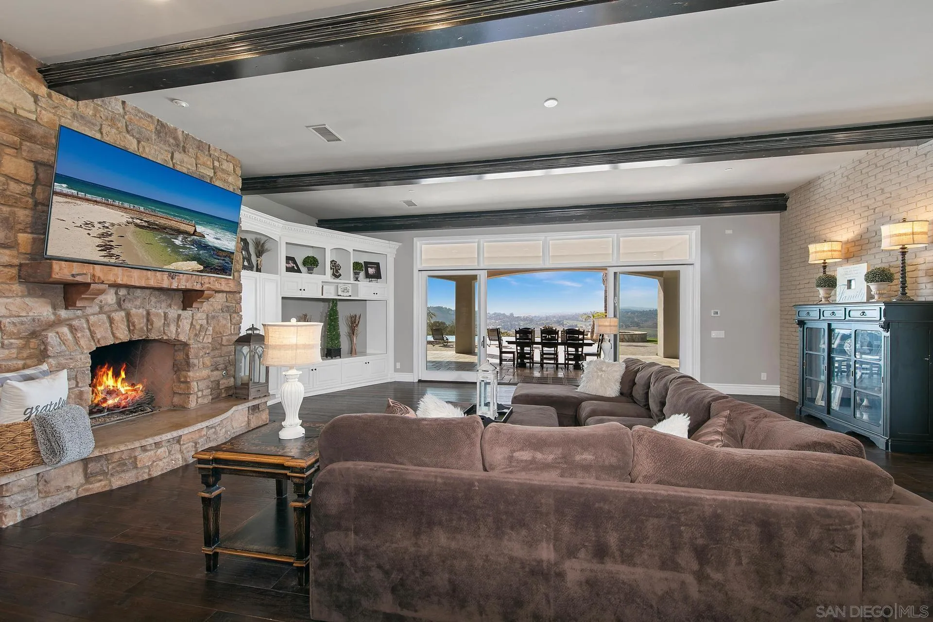 18781 Heritage Drive Poway, CA 92064 - Photo 12 of 69 a living room with furniture and a fireplace