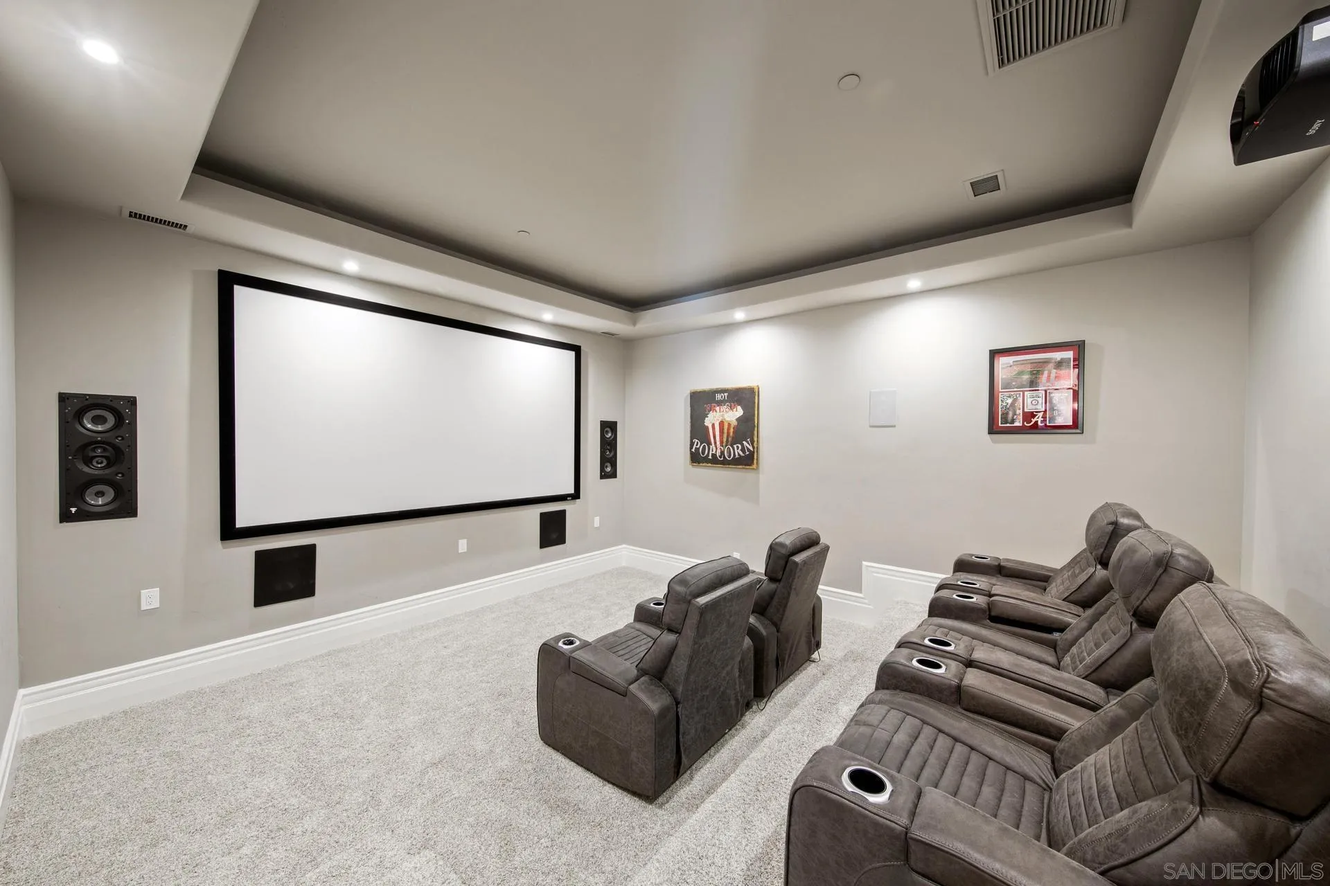 18781 Heritage Drive Poway, CA 92064 - Photo 22 of 69 a projector room with furniture and a projector screen
