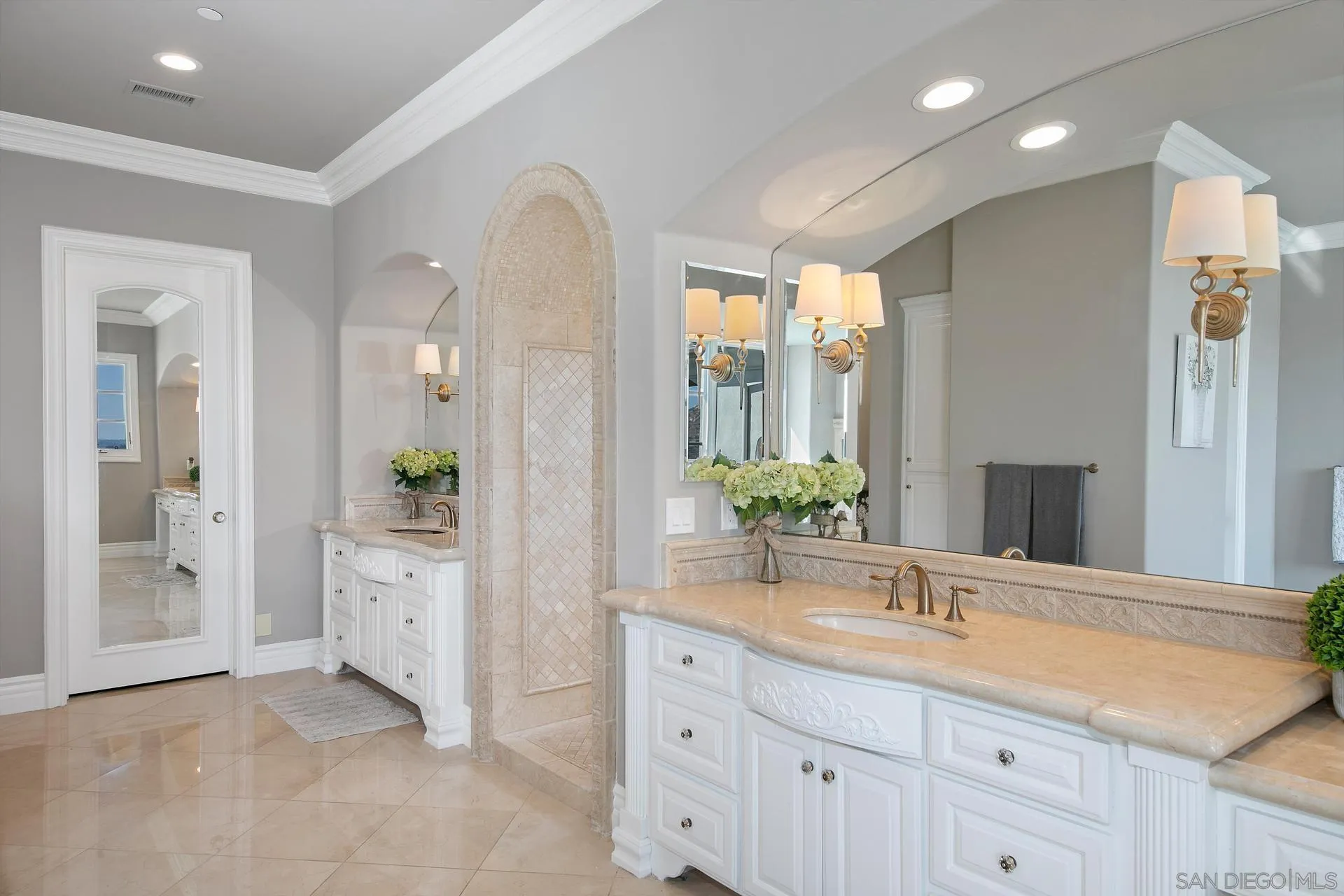 18781 Heritage Drive Poway, CA 92064 - Photo 30 of 69 a spacious bathroom with a granite countertop sink a mirror and a shower