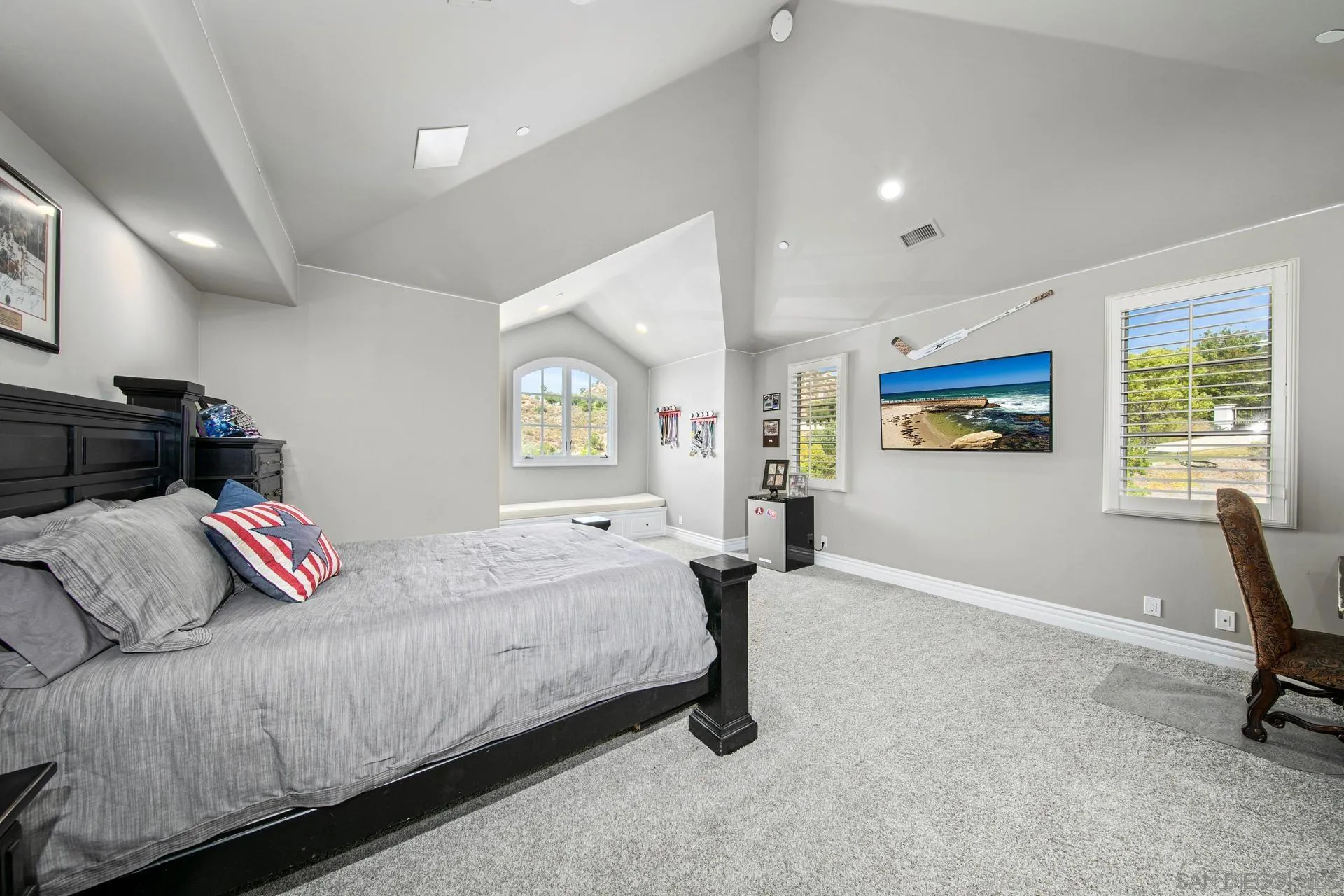 18781 Heritage Drive Poway, CA 92064 - Photo 36 of 69 a bedroom with a bed a table and a window