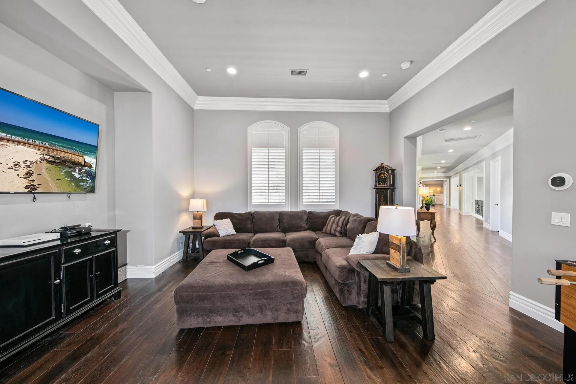 18781 Heritage Drive Poway, CA 92064 - Photo 42 of 69 a living room with furniture and wooden floor