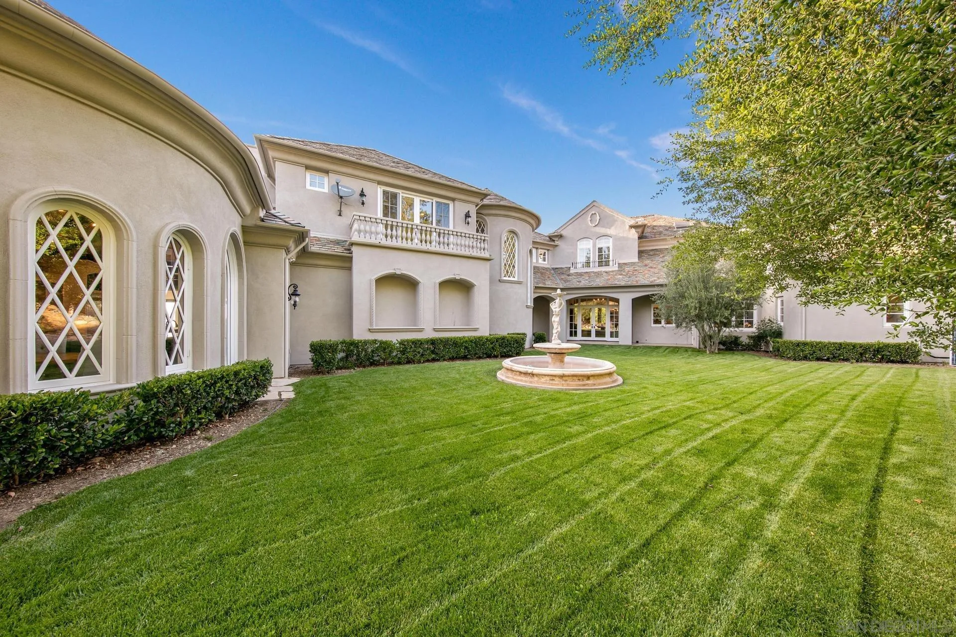 18781 Heritage Drive Poway, CA 92064 - Photo 54 of 69 a front view of a house with yard and green space
