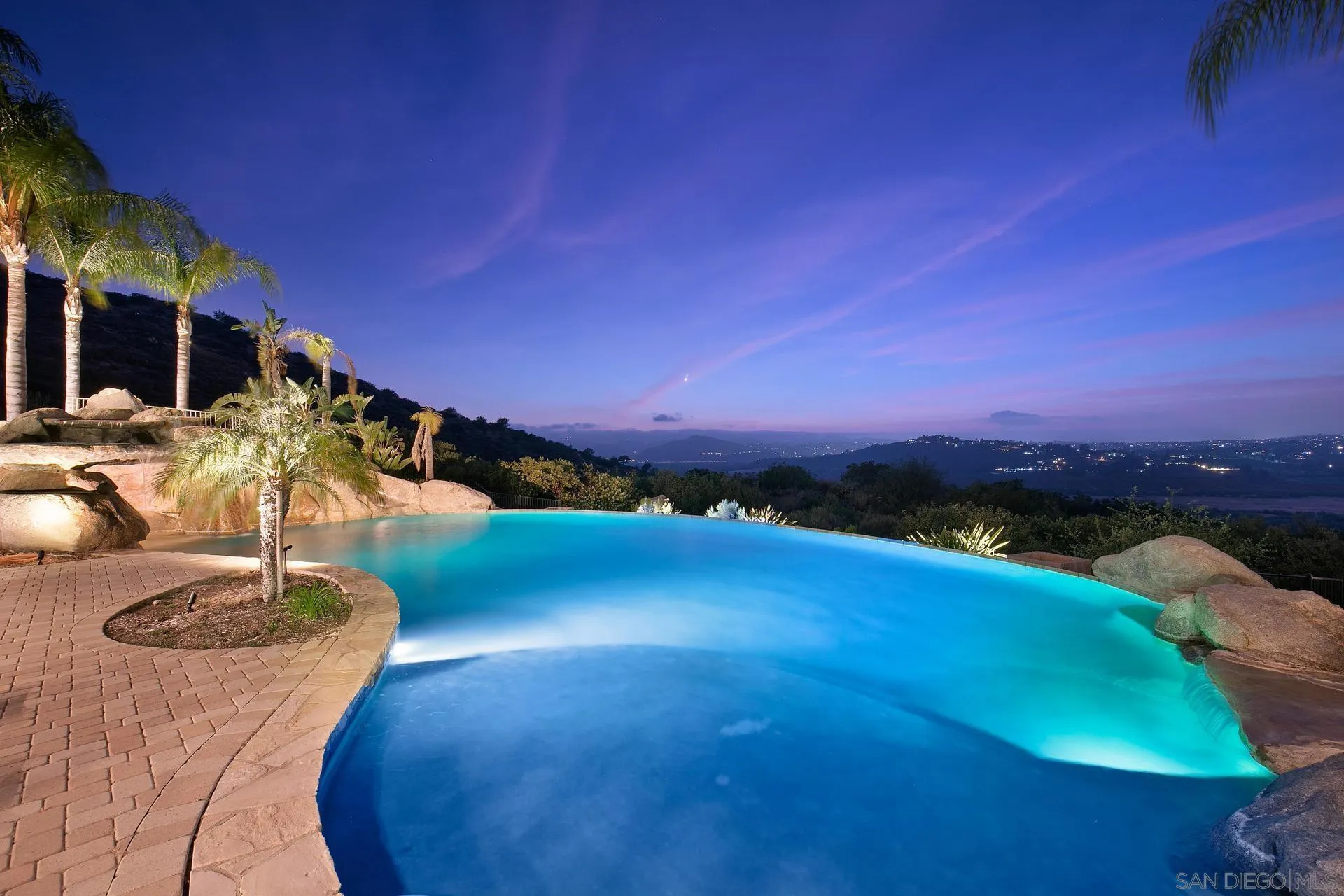 18781 Heritage Drive Poway, CA 92064 - Photo 62 of 69 a view of a lake with a swimming pool