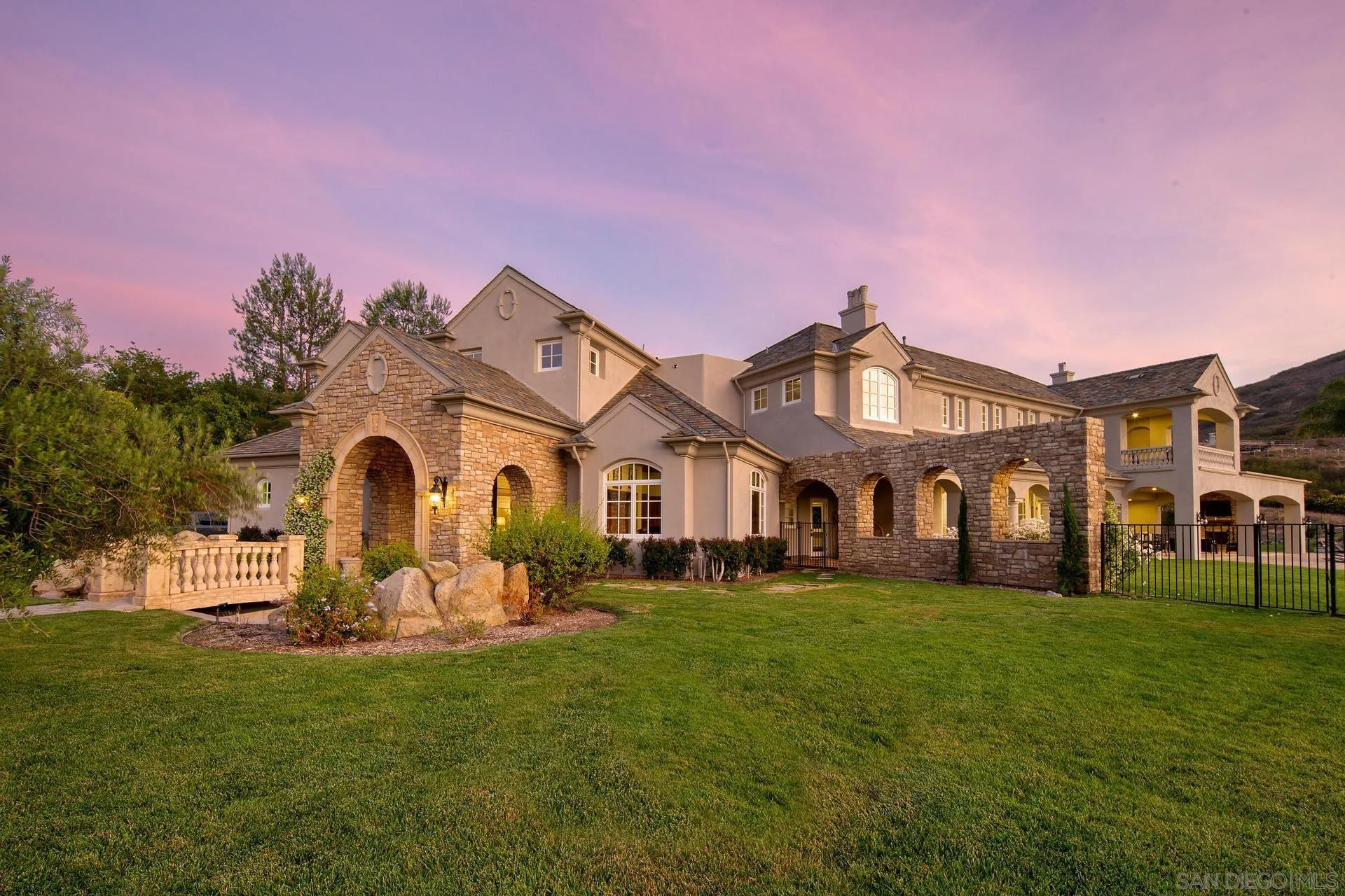 18781 Heritage Drive Poway, CA 92064 - Photo 65 of 69 a front view of a house with a garden