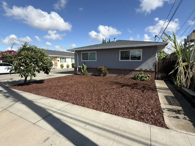 a view of a house with a patio