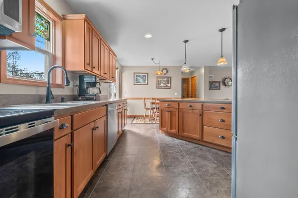 $374,900 | 6877 Rowley Drive, Osseo, MI 49266