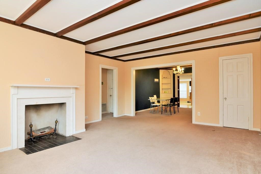 1961 Dryden Road Houston, TX 77030 - Photo 23 of 33 a view of living room with furniture and a fireplace