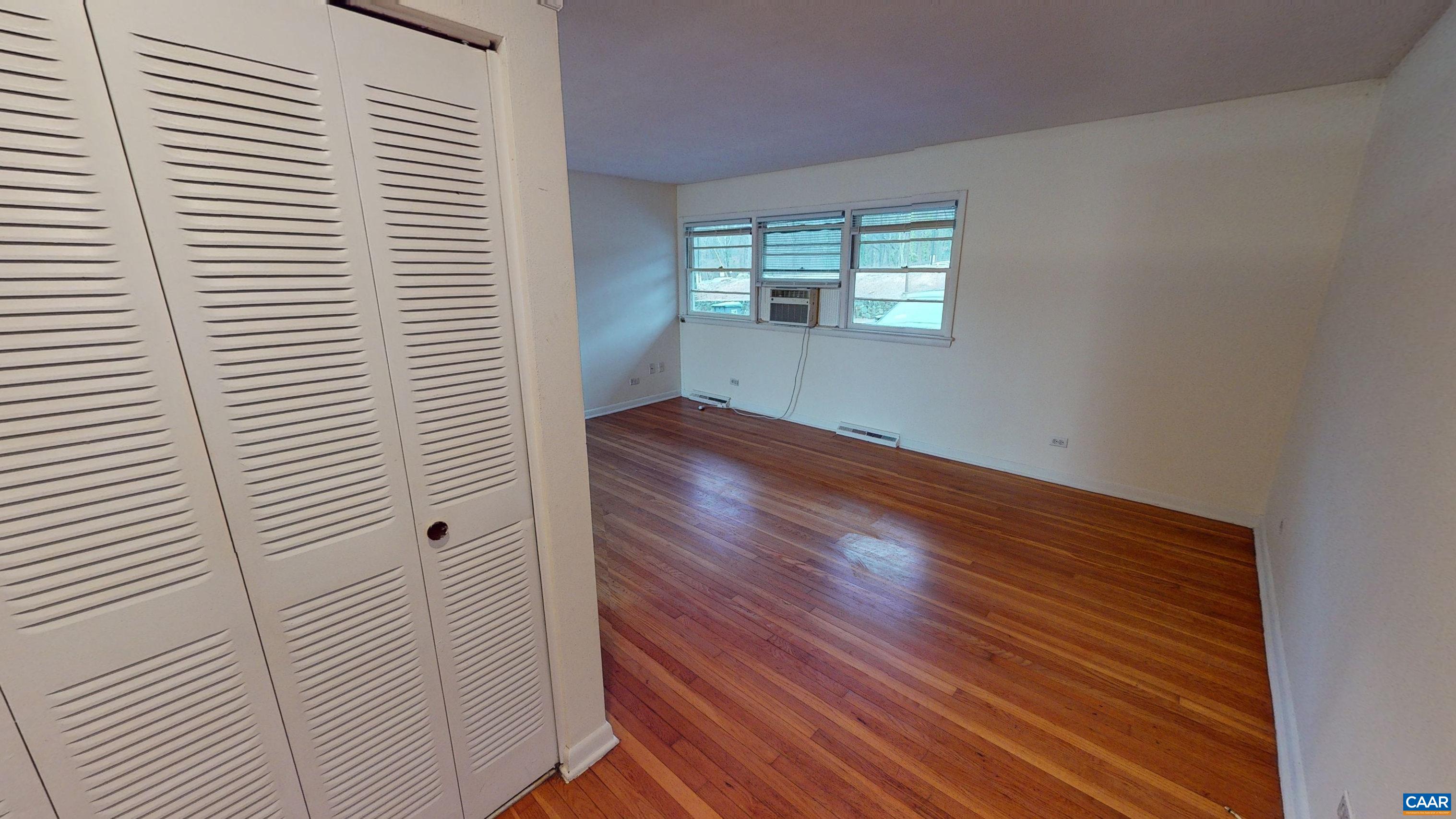 130 Apple Tree Road, Unit A Charlottesville, VA 22903 - Photo 2 of 16 wooden floor in an empty room