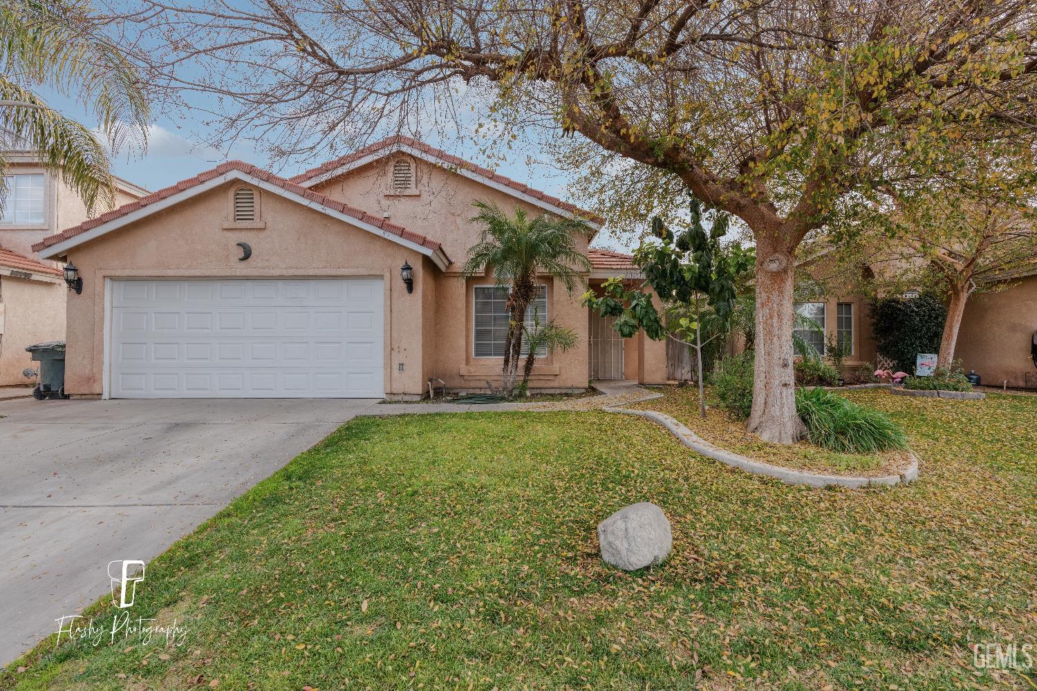 Undisclosed Address Bakersfield, CA 93313 - Photo 1 of 27 a bathroom with a sink and mirror