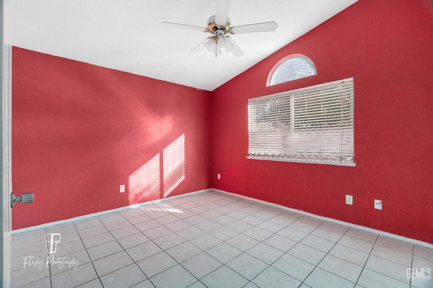 Undisclosed Address Bakersfield, CA 93313 - Photo 16 of 27 a view of an empty room with a window