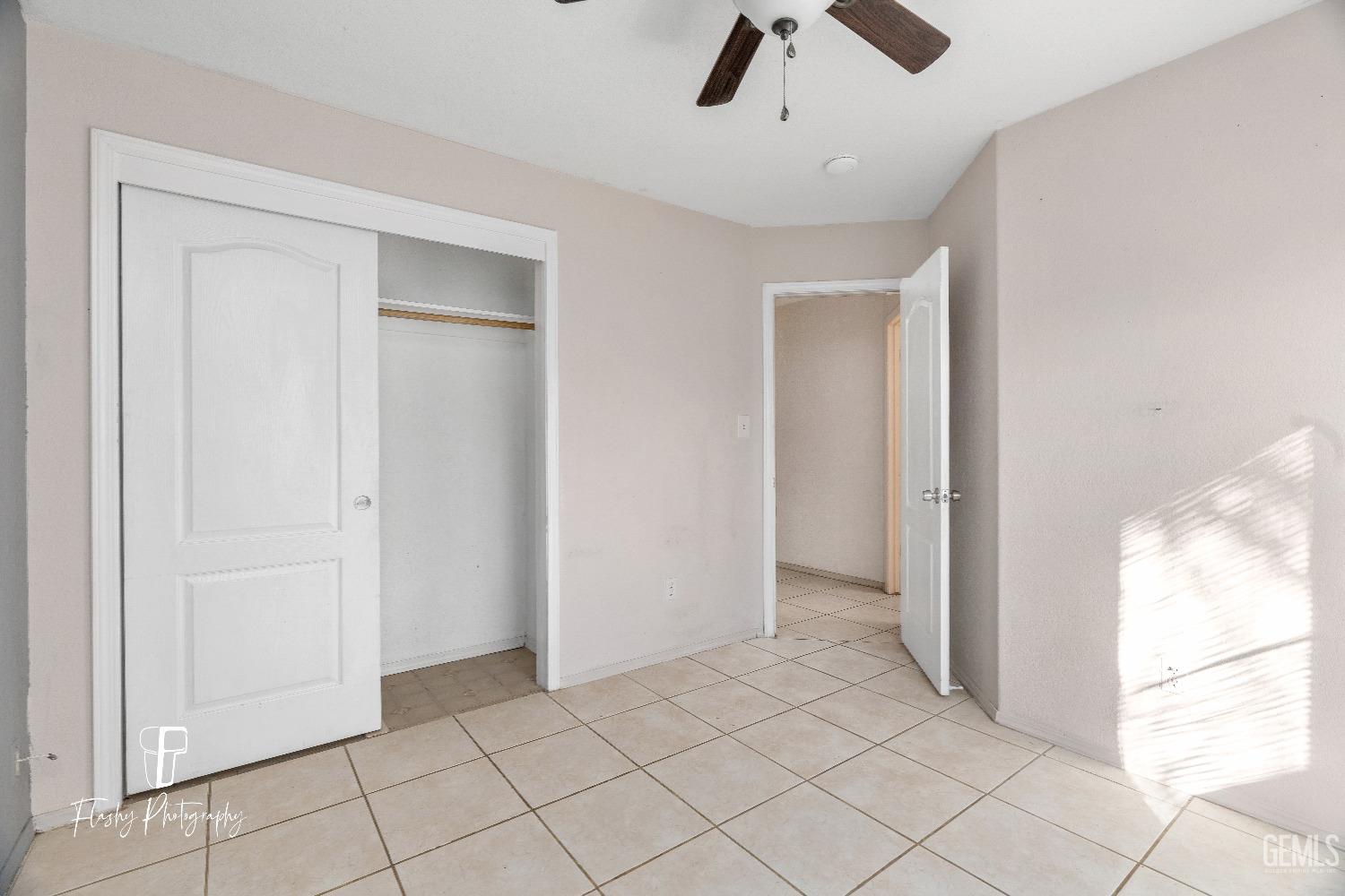 Undisclosed Address Bakersfield, CA 93313 - Photo 21 of 27 a view of an empty room and window