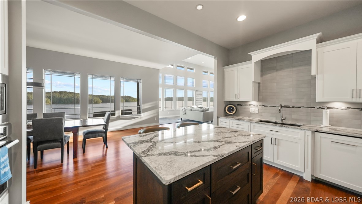 777 Malibu Road Osage Beach, MO 65065 - Photo 33 of 100 The kitchen, dining, and living areas all flow tog